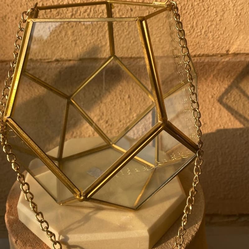 Geomatric brass and glass decore